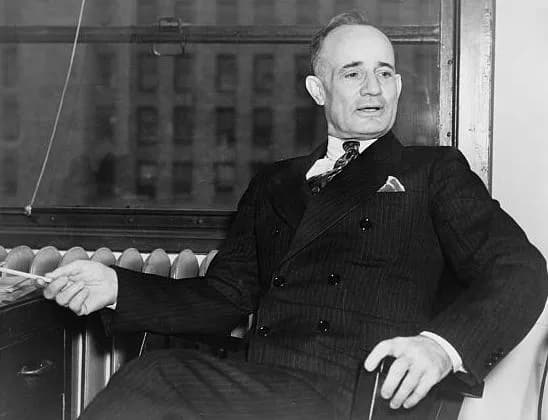 Napoleon Hill - Napoleon Hill, American self-help writer, attorney and journalist, seated in a chair. (three-quarter length portrait)