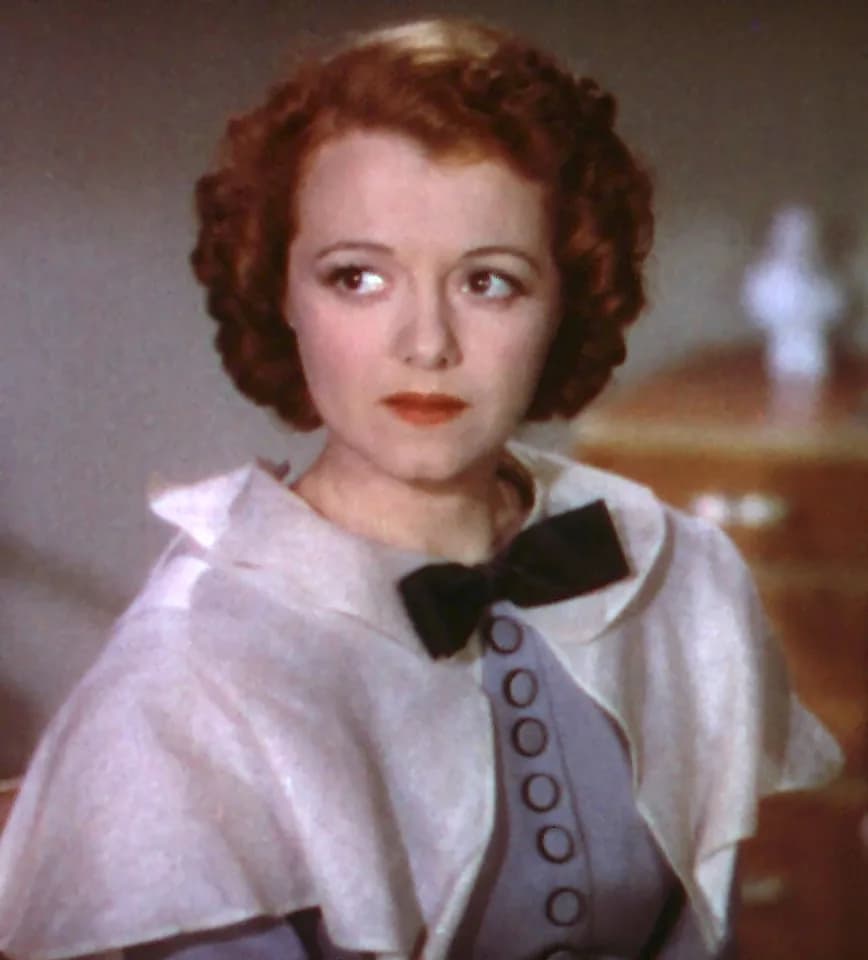 Janet Gaynor - Cropped screenshot of Janet Gaynor from the film A Star is Born. Costume designed by Omar Kiam