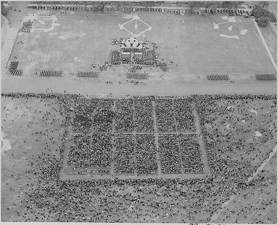 Chester W. Nimitz - Photograph evidently taken from top of Washington Monument, of crowd assembled below for ceremonies honoring Admiral... - NARA - 199207.jpg