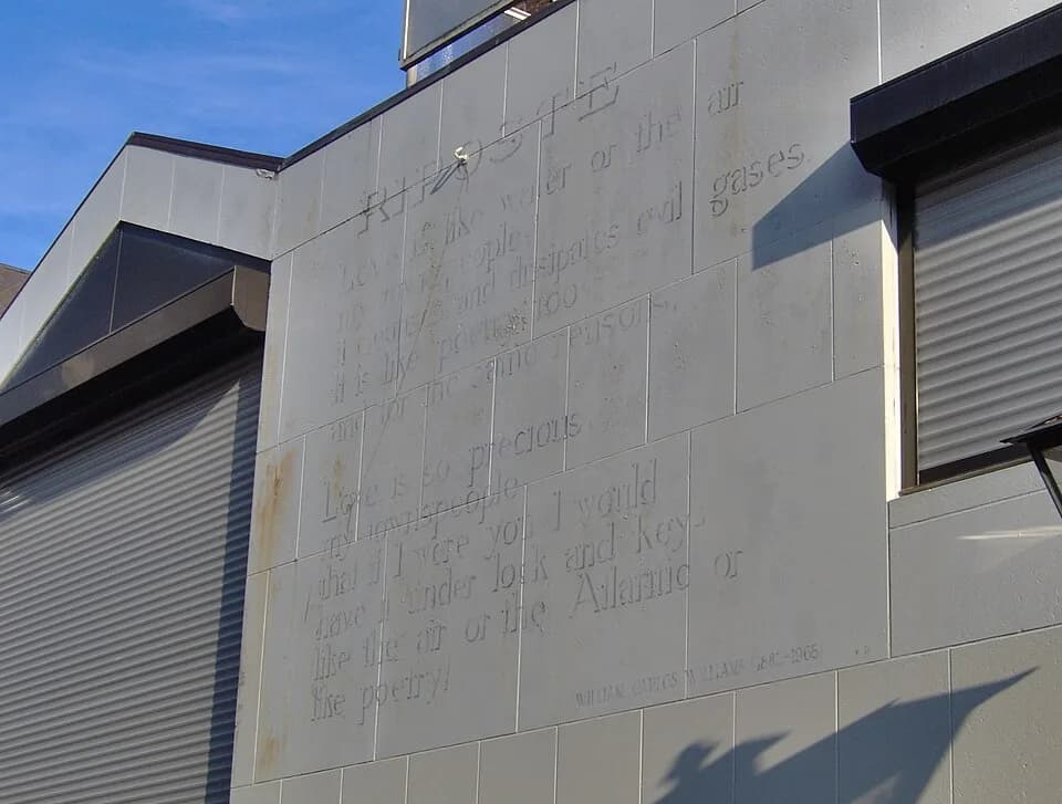 William Carlos Williams - The poet Riposte of the American poet William Carlos Williams on a wall of the building at Breestraat 81, Leiden, The Netherlands, currently hardly visible because of its bad
