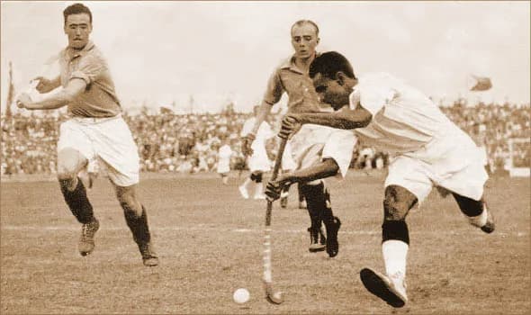 Major Dhyan Chand Singh - Dhyan Chand with the ball vs. France in the 1936 Olympic semi-finals